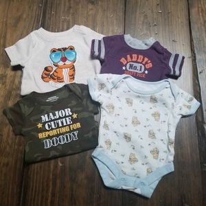 Lot of 4 Newborn Onesies Tiger Pooh Camo Daddy